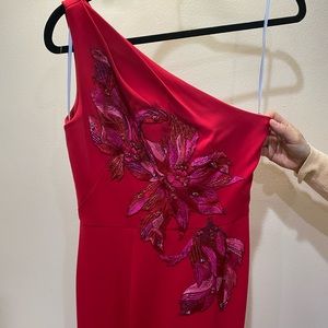 Red evening gown, on shoulder